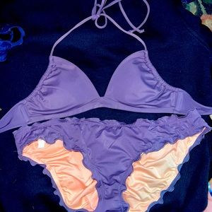 2 piece ruffle bottom swim suite purple and coral